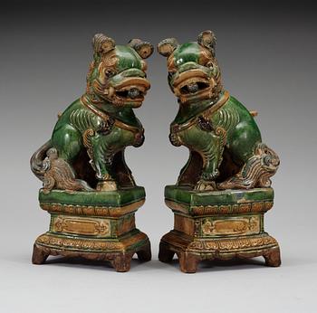 A pair of seated Buddhist lions, 17th Century.