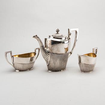A three piece silver coffee service mark of CG Hallberg Stockholm 1916, weight 896 gram.