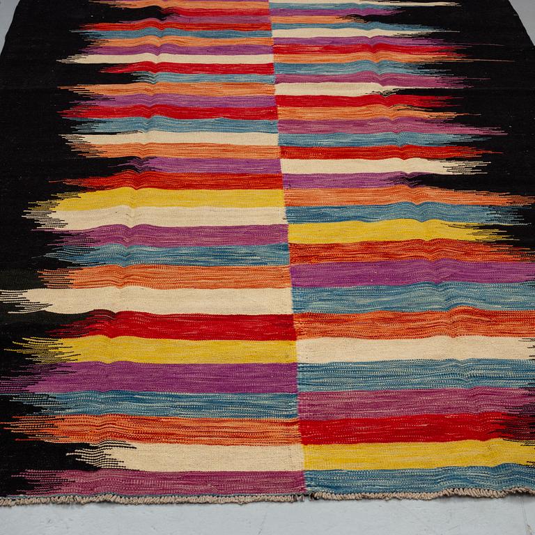 A carpet, kilim 302 x 197.