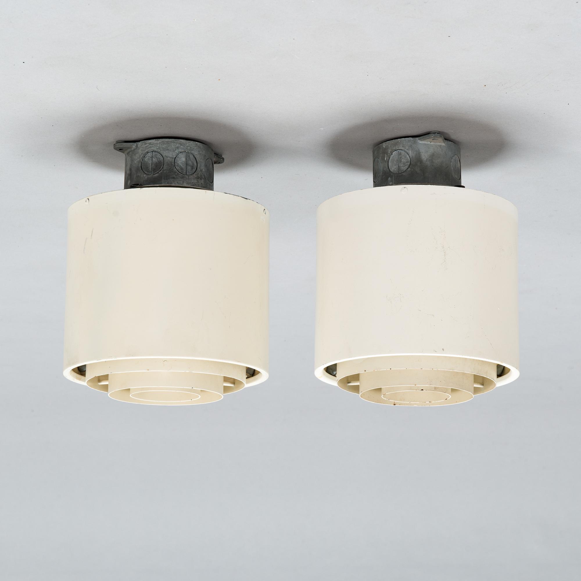 Alvar Aalto, a pair of mid-20th century ceiling lights for Idman.