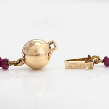 A necklace, set with rubies, clasp in 14K gold.