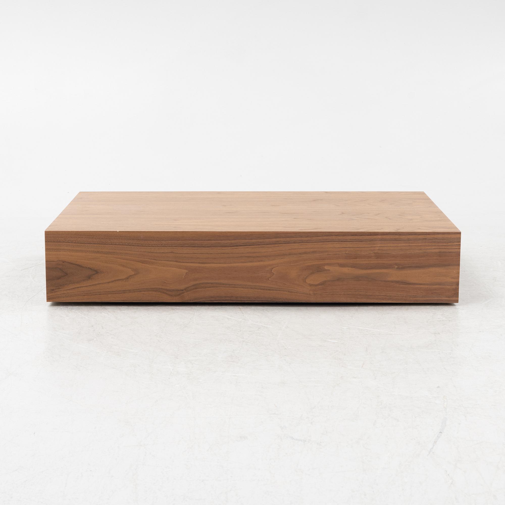 A 'Mass Wide' walnut veneered coffee table from New Works.