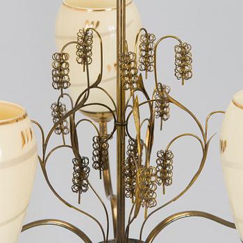 Paavo Tynell, kattovalaisin, malli 9015, Taito 1900-luvun puoliväli.