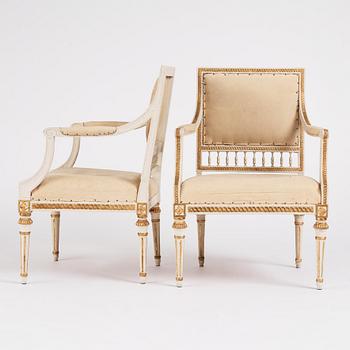 A pair of Gustavian open armchairs by J. Lindgren (master in Stockholm 1770-1800).