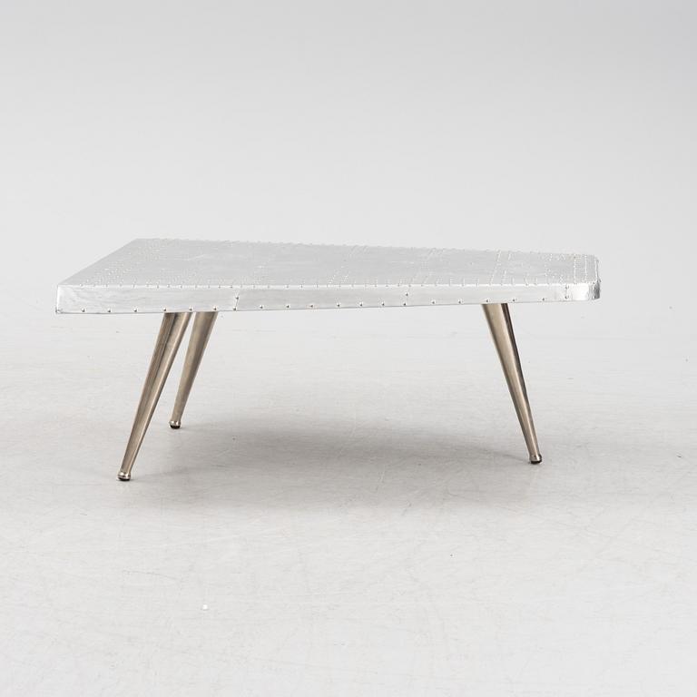 A coffee table constructed by a plane wing, second half of the 20th Century.