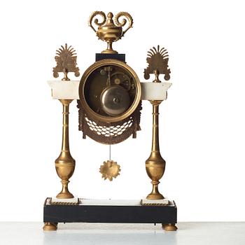 A Louis XVI circa 1790 mantel clock.