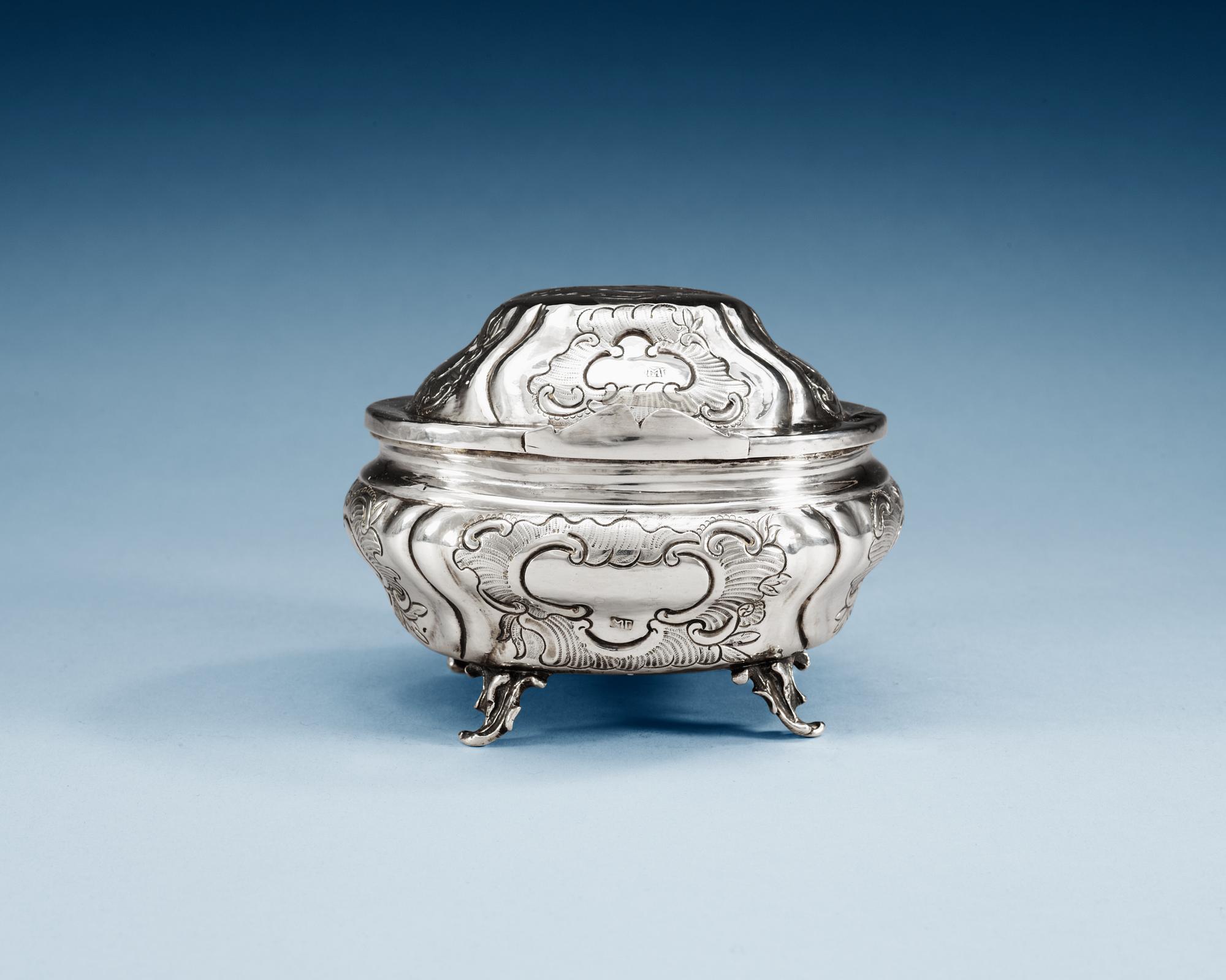 A RUSSIAN PARCEL-GILT SUGAR-CASKET, unidentified makers mark, Moscow 1777.