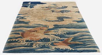 An antique Baotou rug, northern China, late Qing dynasty, circa 1900. c. 178x90 cm.