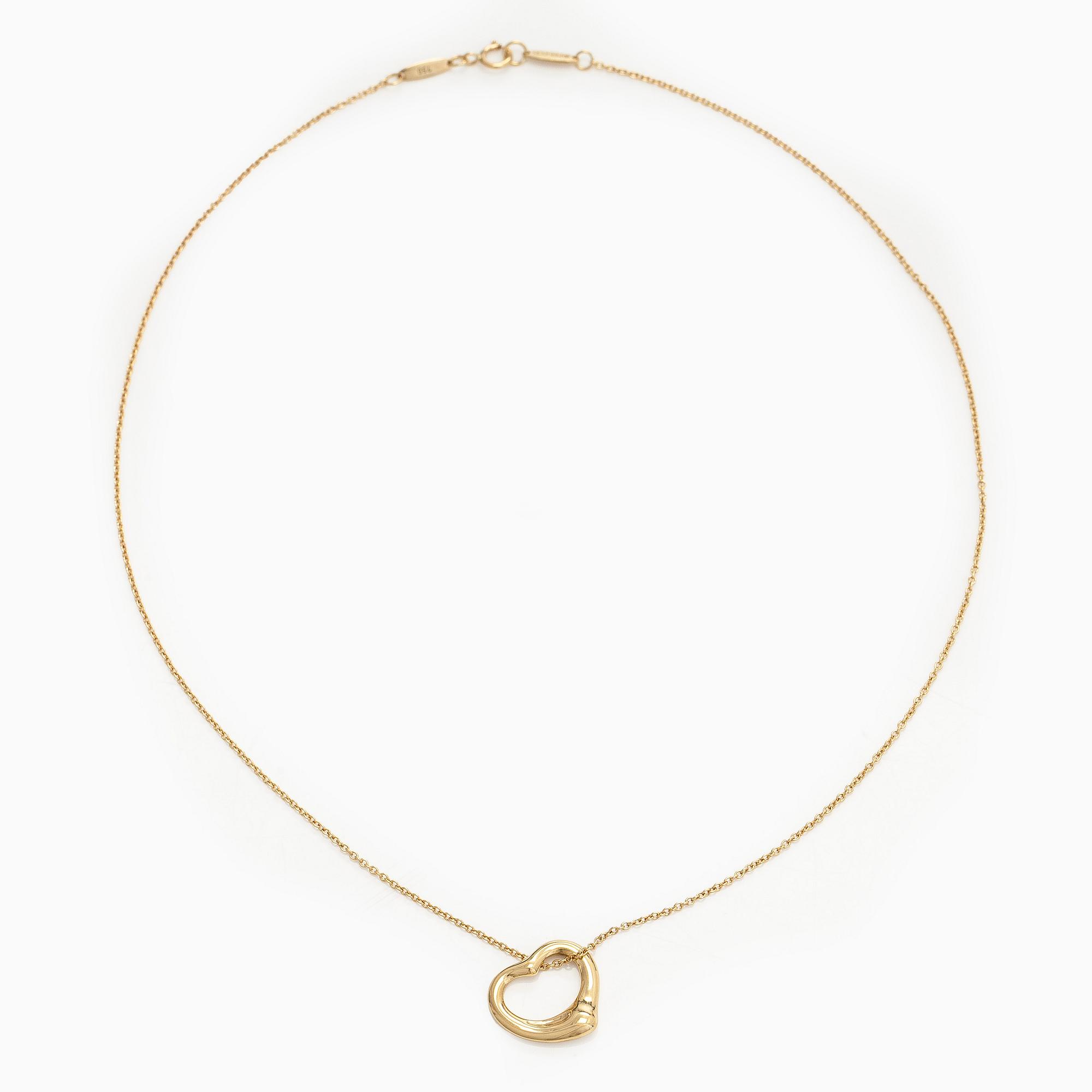 Tiffany & Co, Elsa Peretti, an 18K gold "Open Heart" necklace.