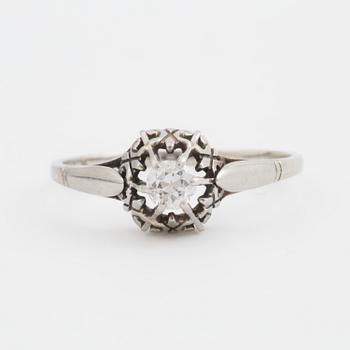 A ring set with a transitional-cut diamond.