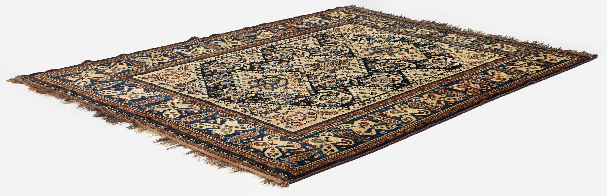 An antique Qashqai rug, South Persia, c. 189 x 142 cm.