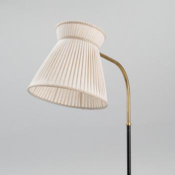 A 1950s model 2063 floor light manufactured by Orno.