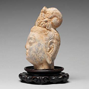 A stone sculpture of Guanyin, presumably Ming dynasty, 17th Century.