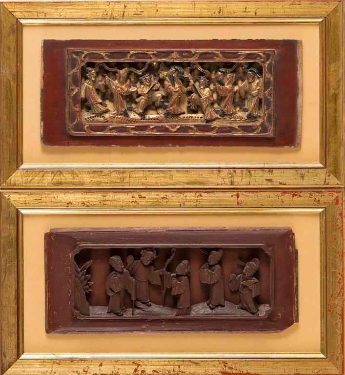 Two Chinese wall reliefs in carved wood, second half of the 20th century.