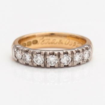 Sormus, 18K kultaa ja timantteja n. 0.57 ct yht. Helkelä Oy Kultasepänliike, Rauma 2004.