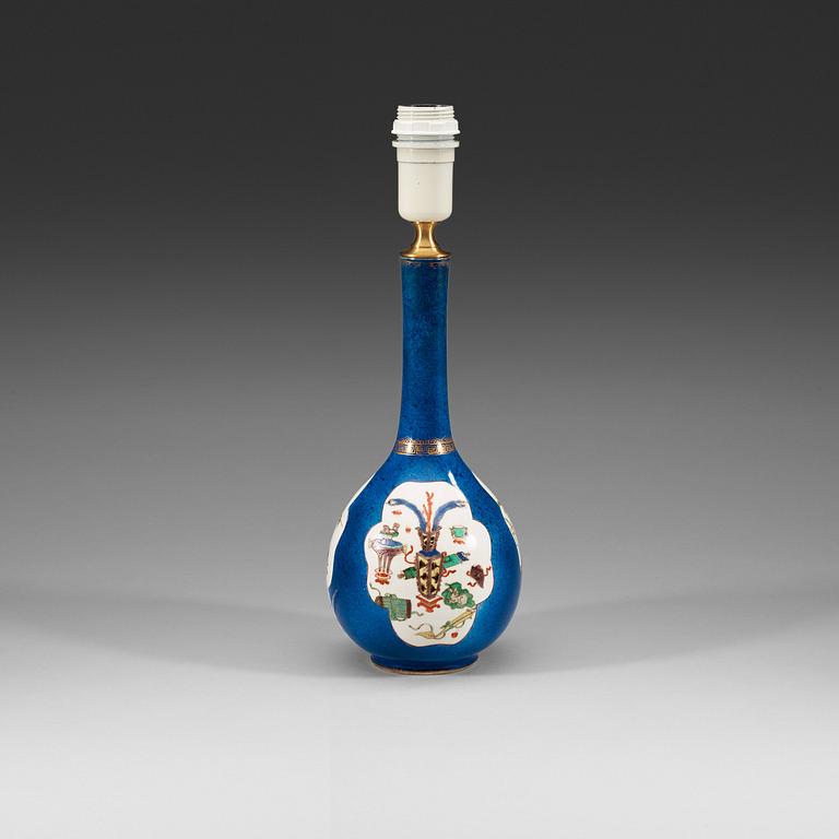 A powder blue ground vase with gilding and 'famille-verte' enamels within reserves, Qing dynasty, Kangxi (1622-1722).