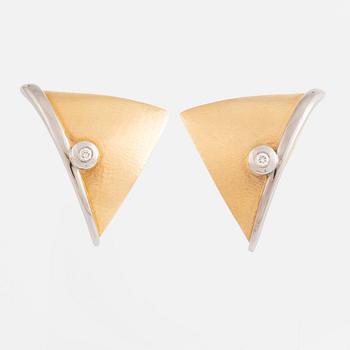 A pair of 18K gold Ole Lynggard earrings set with round brilliant-cut diamonds.