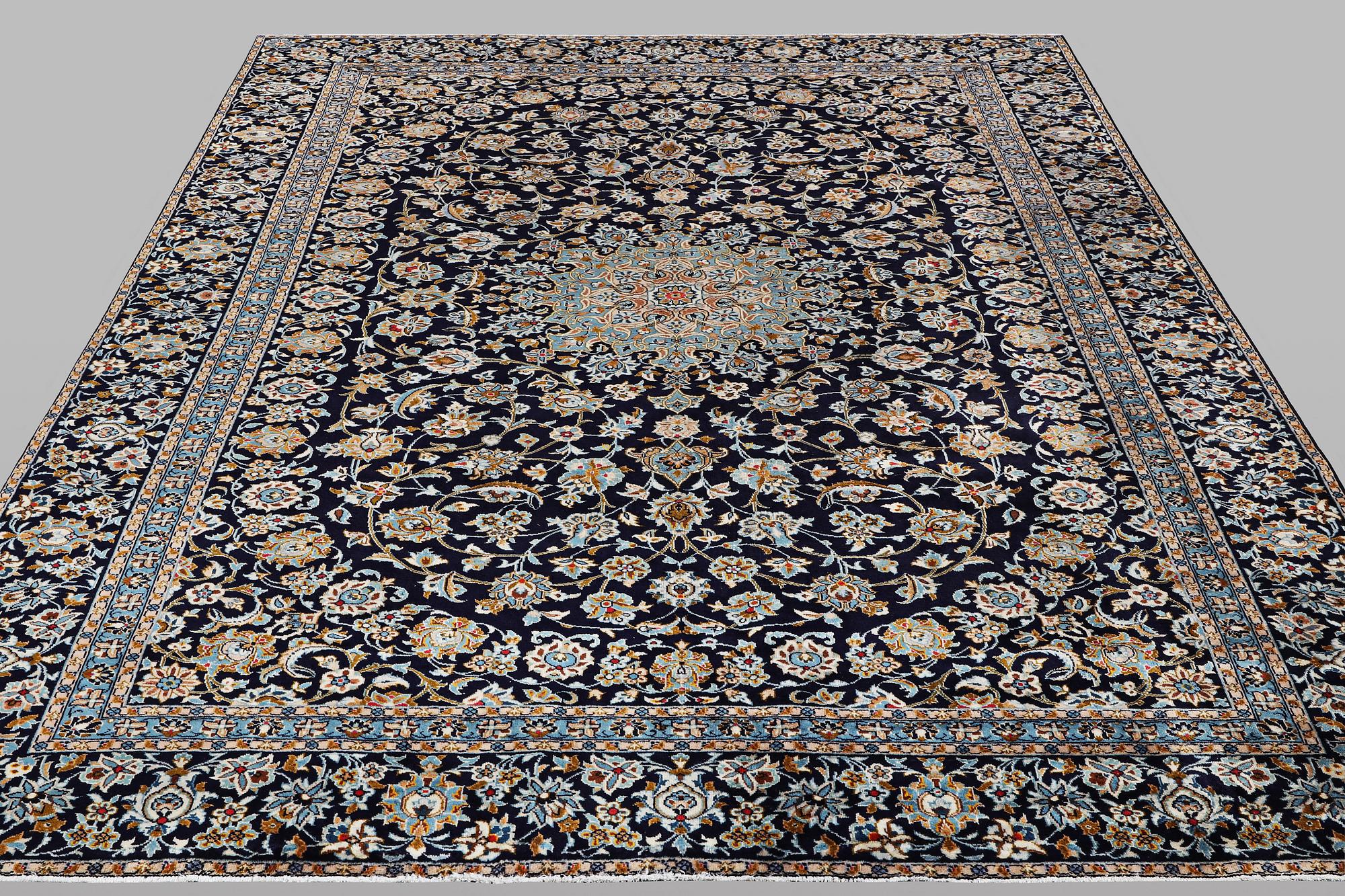 A carpet, Kashan, ca 391 x 286 cm.