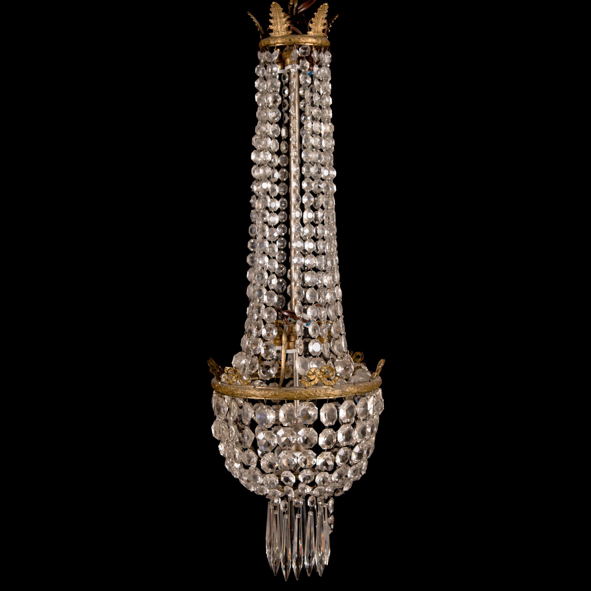 An early 20th century cut glass chandelier.