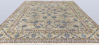 A Royal Keshan carpet, signed, 410 x 307 cm.