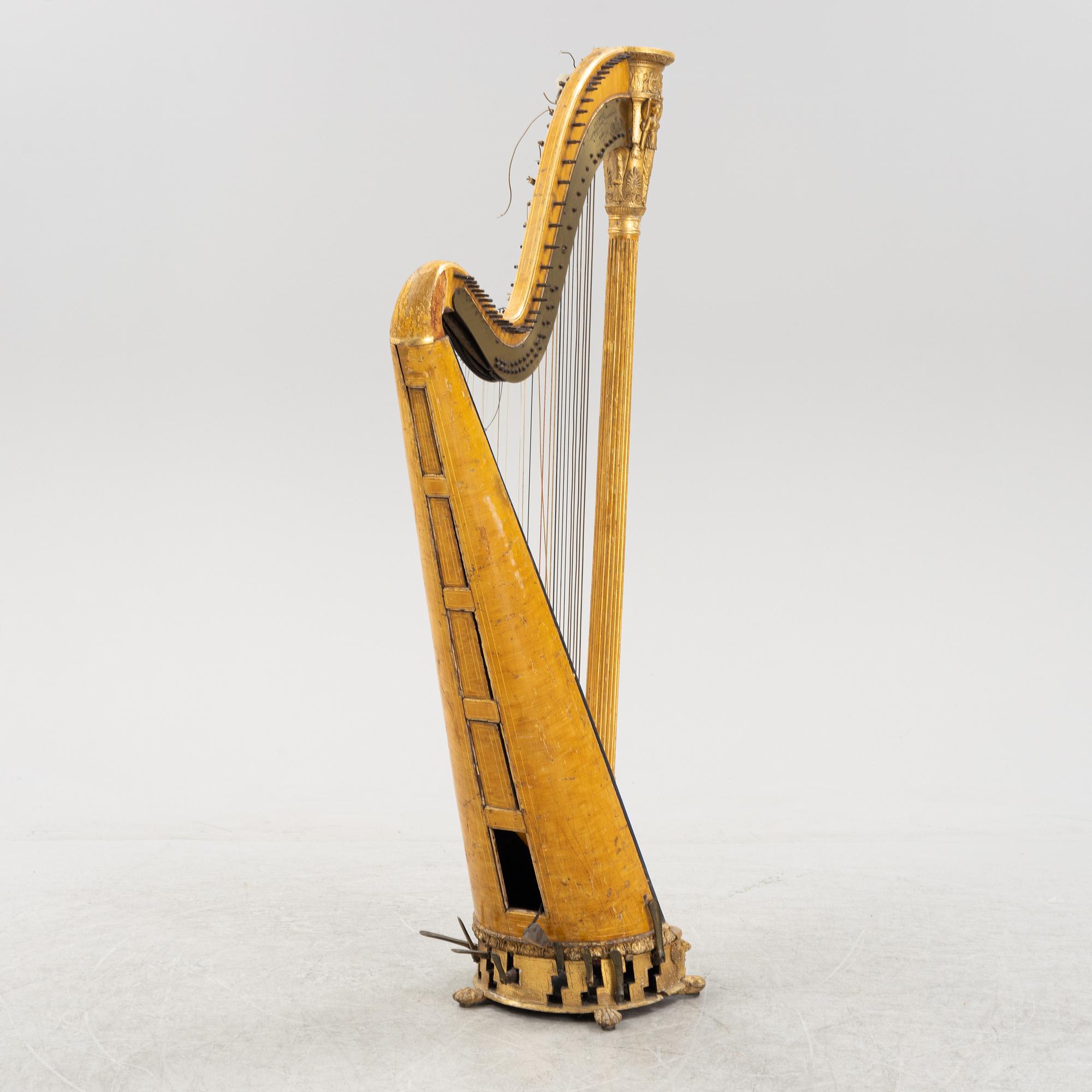 A pedal harp by Jacob & James Erat, London, No 1610, probably made between 1825-1830.