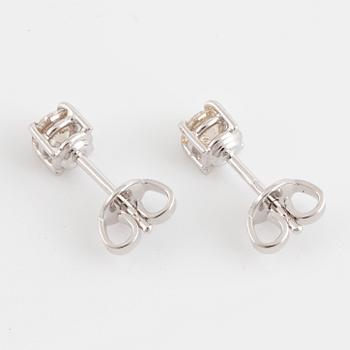 Brilliant-cut diamond stud earrings, with IGI report.