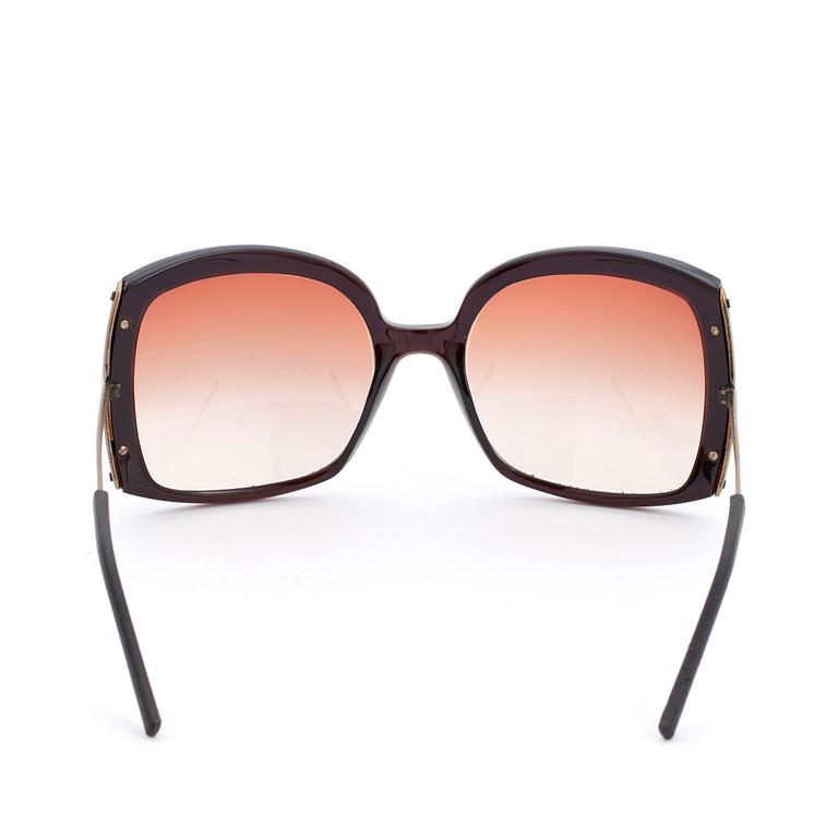 BOTTEGA VENETA, ett par solglasögon.