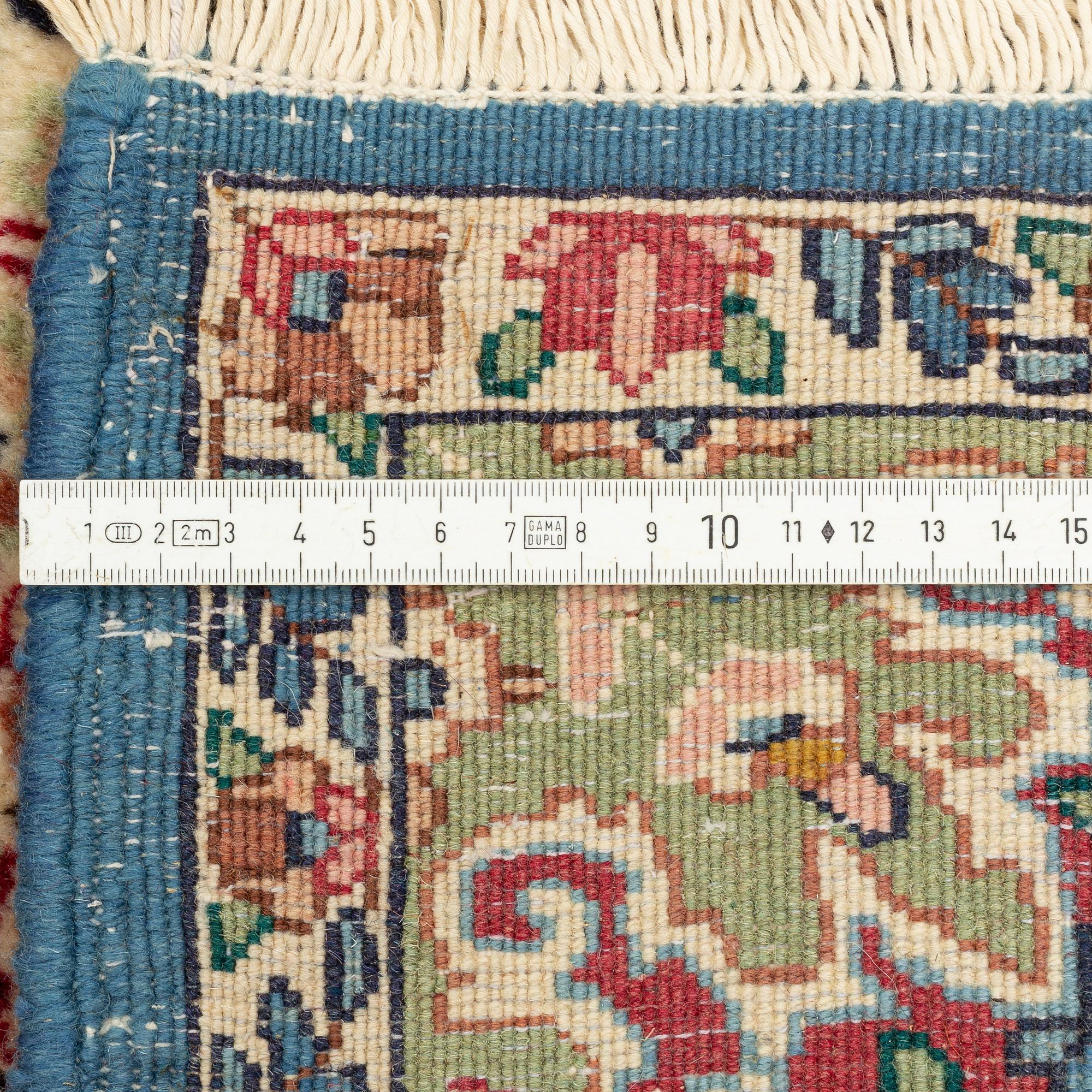 A rug, Kerman, ca 230 x 145 cm.