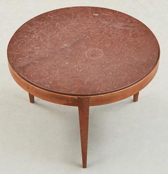 A Josef Frank mahogany and limestone table, Svenskt Tenn.