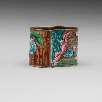 A Russian 20th century silver-gilt and enamelnapkin-ring, marks of the 11th Artel, Moscow 1908-1917.