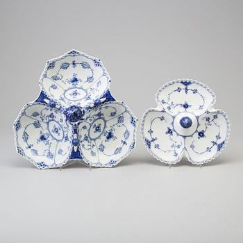 A 63 pcs porcelain service, 'Musselmalet', Helblond, Royal Copenhagen, Denmark, second half of the 20th century.