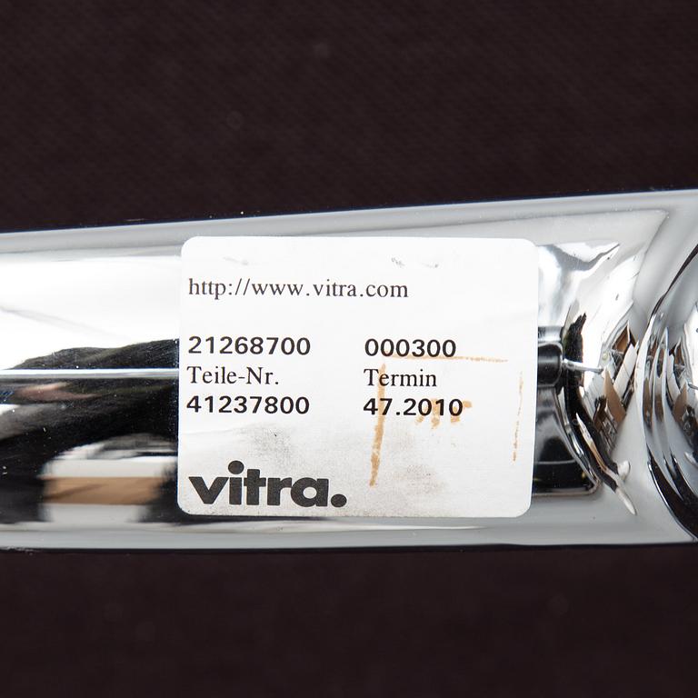 An EA 208 Soft Pad swivel chair by Charles and Ray Eames for Vitra, dated 2010.