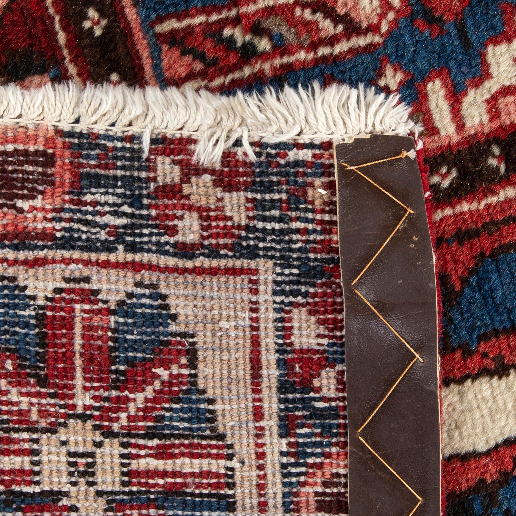 An old Bachtiari carpet ca 300 x 162 cm.