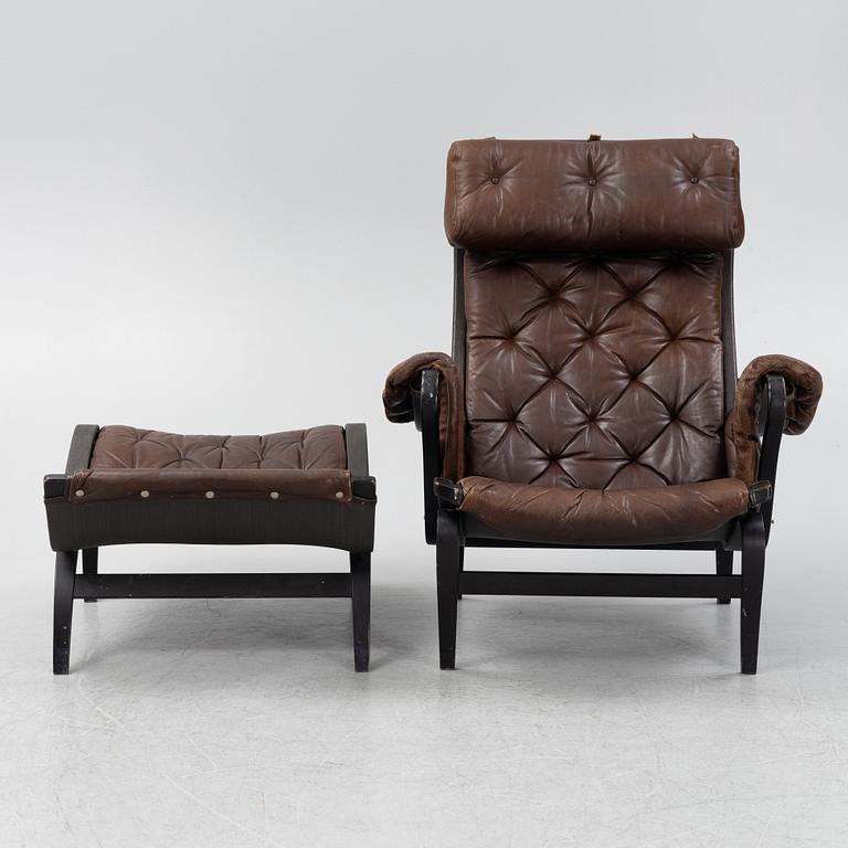 Bruno Mathsson, a 'Pernilla' armchair with ottoman, Dux, Sweden, second half of the 20th century.