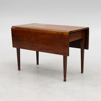 Table with drop leaves, 19th century.