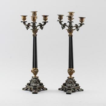 KANDELABRAR, 1 par, patinerad brons, senempire, 1800-talets mitt.
