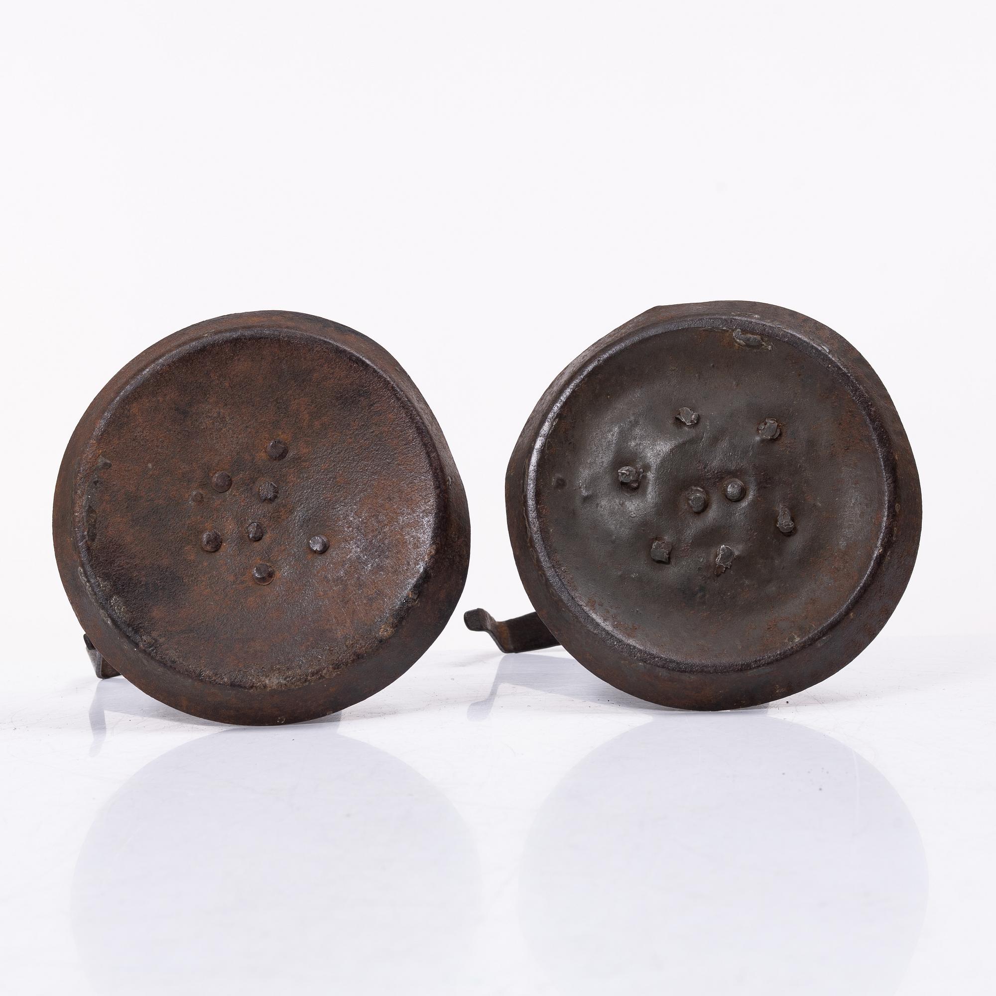 A pair of similar candle holders, 19th century.