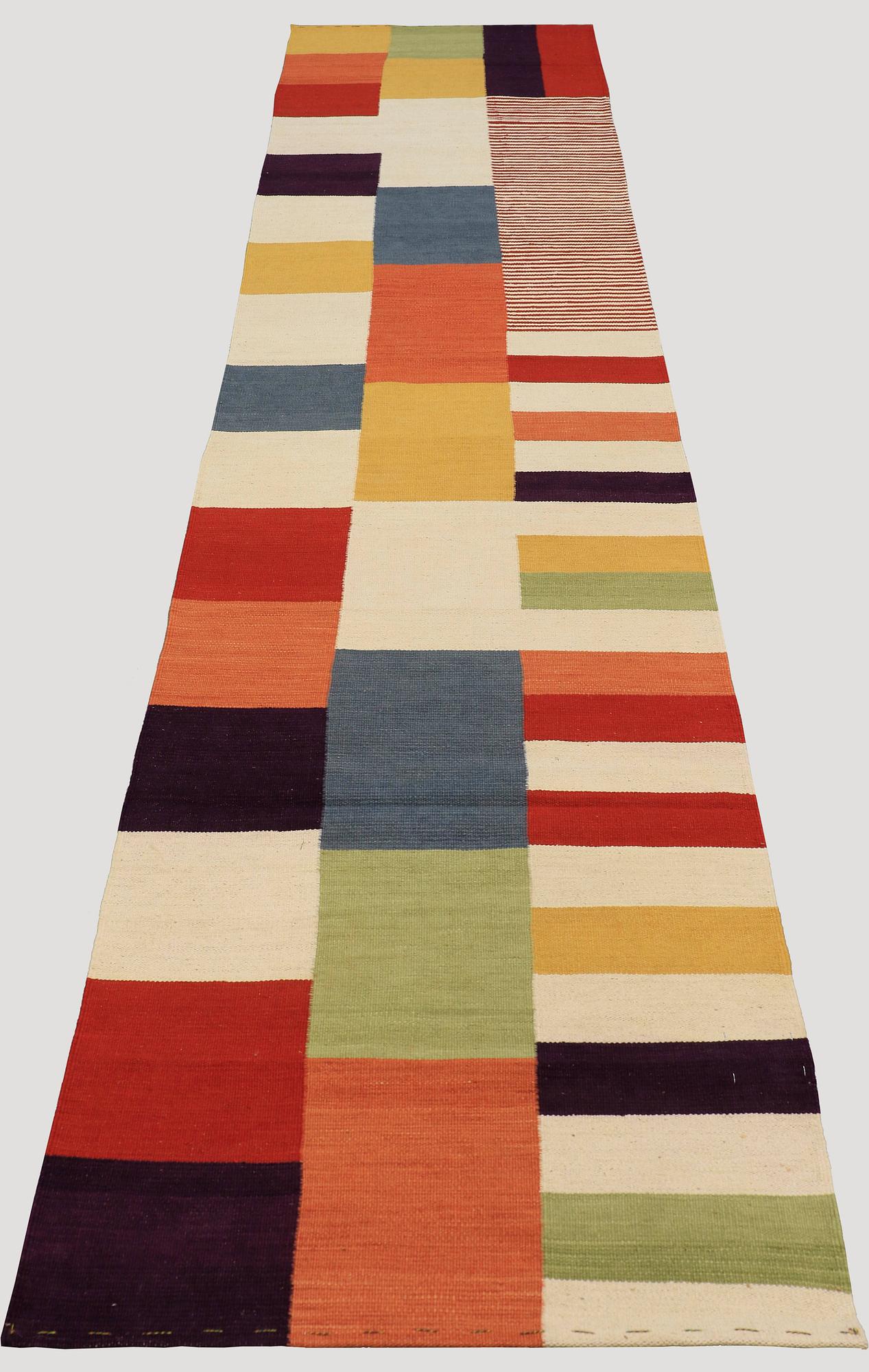A runner, flat weave, ca 390 x 80 cm.