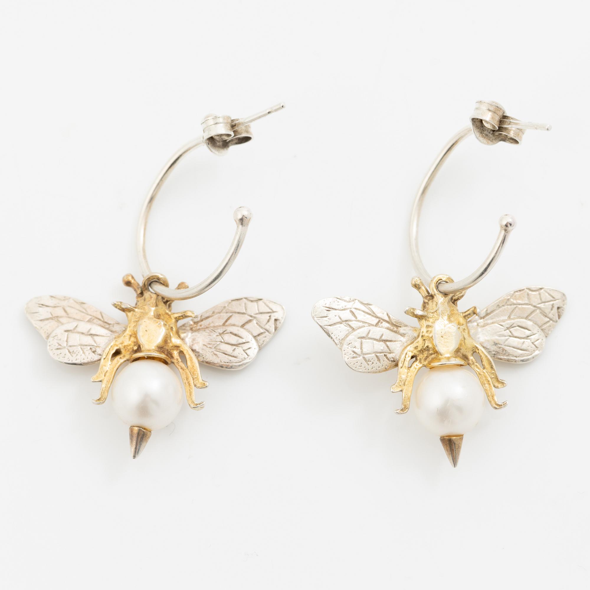 Maria Nilsdotter, a single earring, "rain earring" and a pair, silver with pearls and quartz.