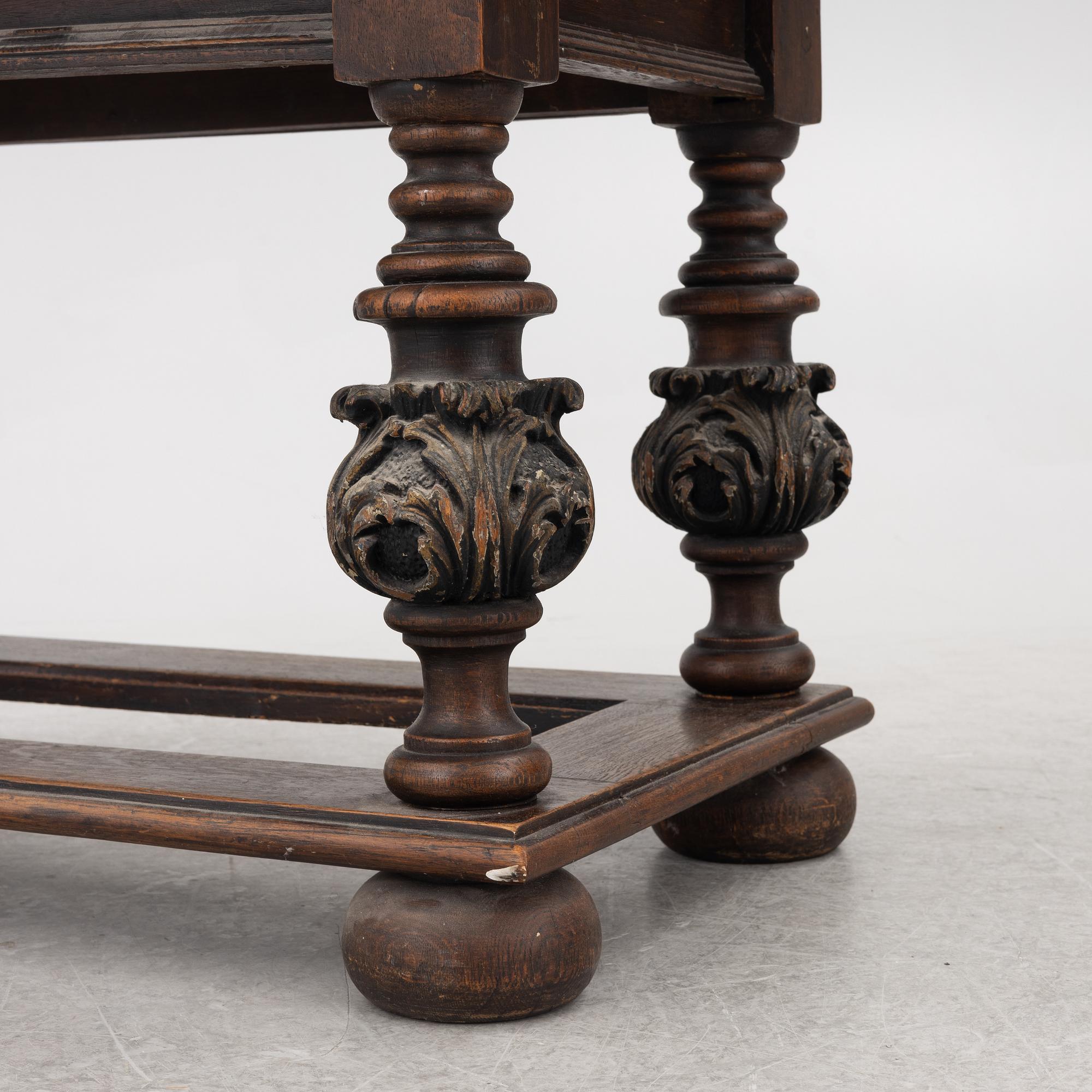 A 19th century Baroque style stone-top table.
