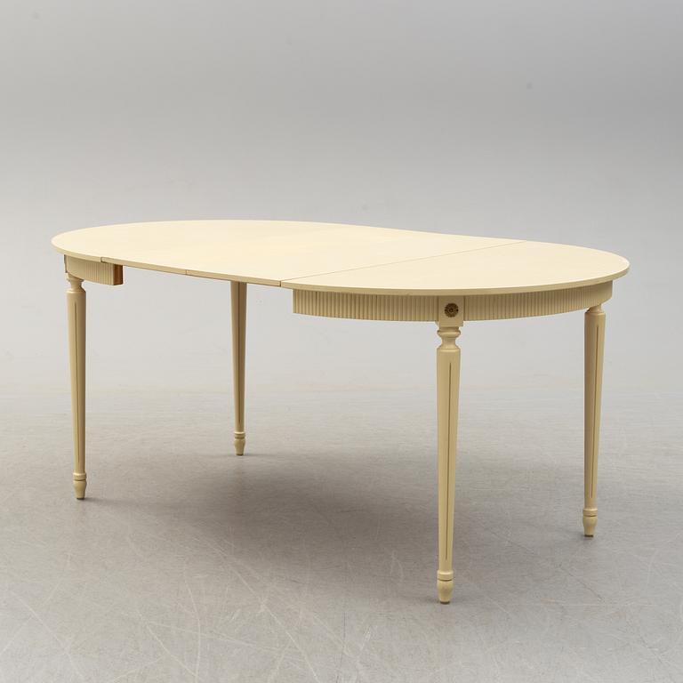 A set of six chairs and a dining table, gustavian style, late 20th century.