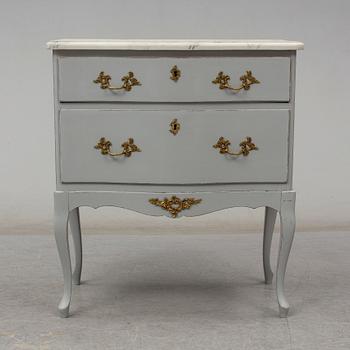 A Rococo style chest of drawers, second half of the 20th century.
