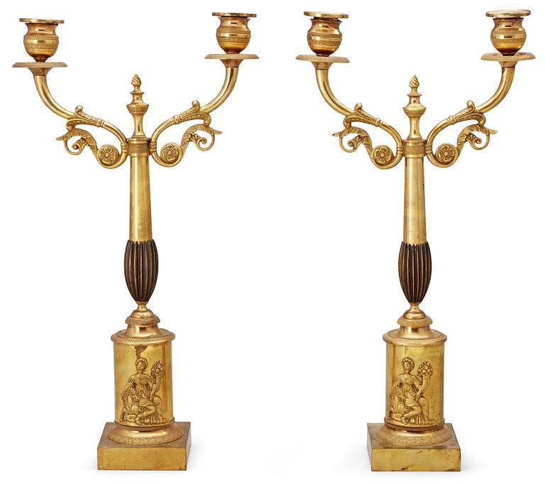 A pair of Swedish Empire 19th century gilt bronze two-light candelabra.
