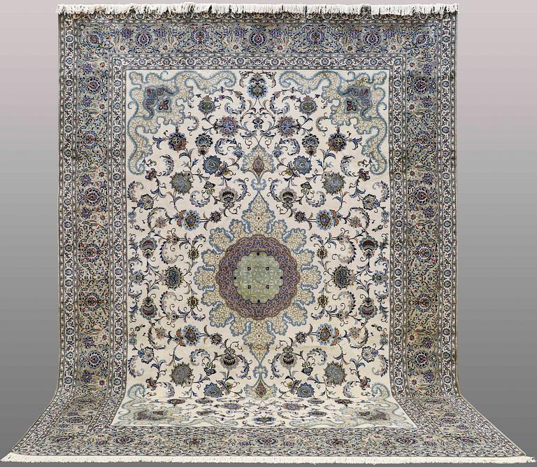 A signed so called Royal Kashan carpet, ca 432 x 313 cm.