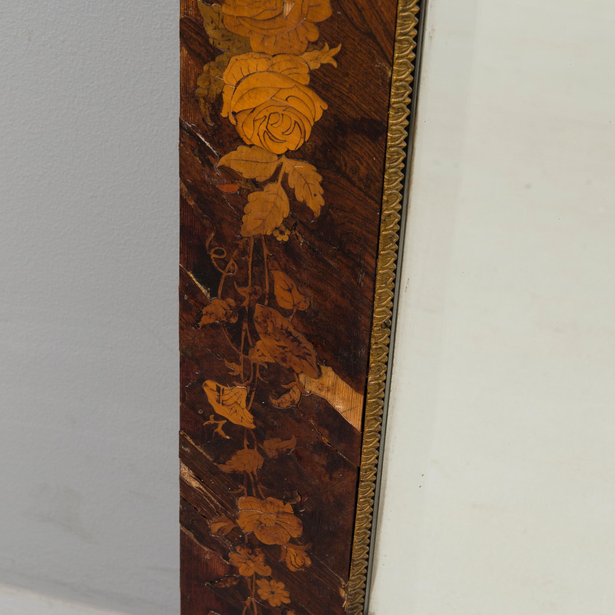 A full-length mirror from the late 19th century.