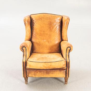 A leather armchair later part of the 20th century.