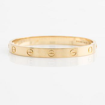 An 18K gold Cartier bracelet "Love".