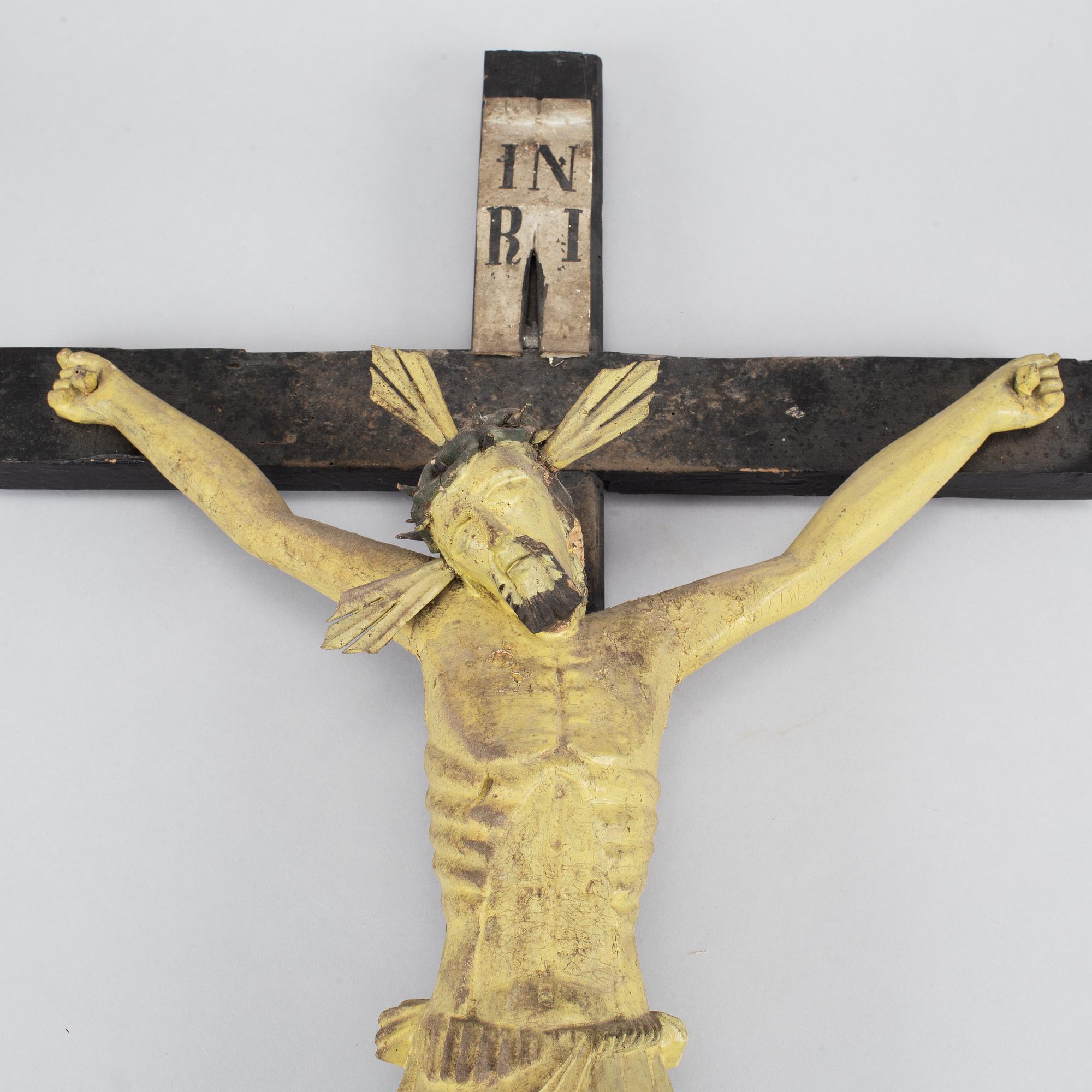 A wooden painted crucifix, 18th/19th century.