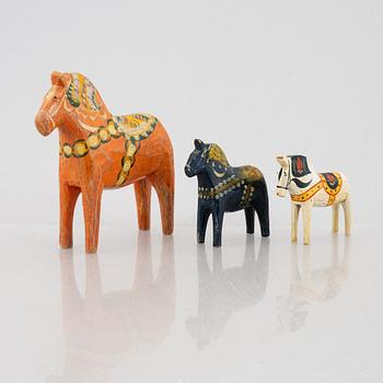 A set of three Dalecarlia horses, around the mid-20th century.