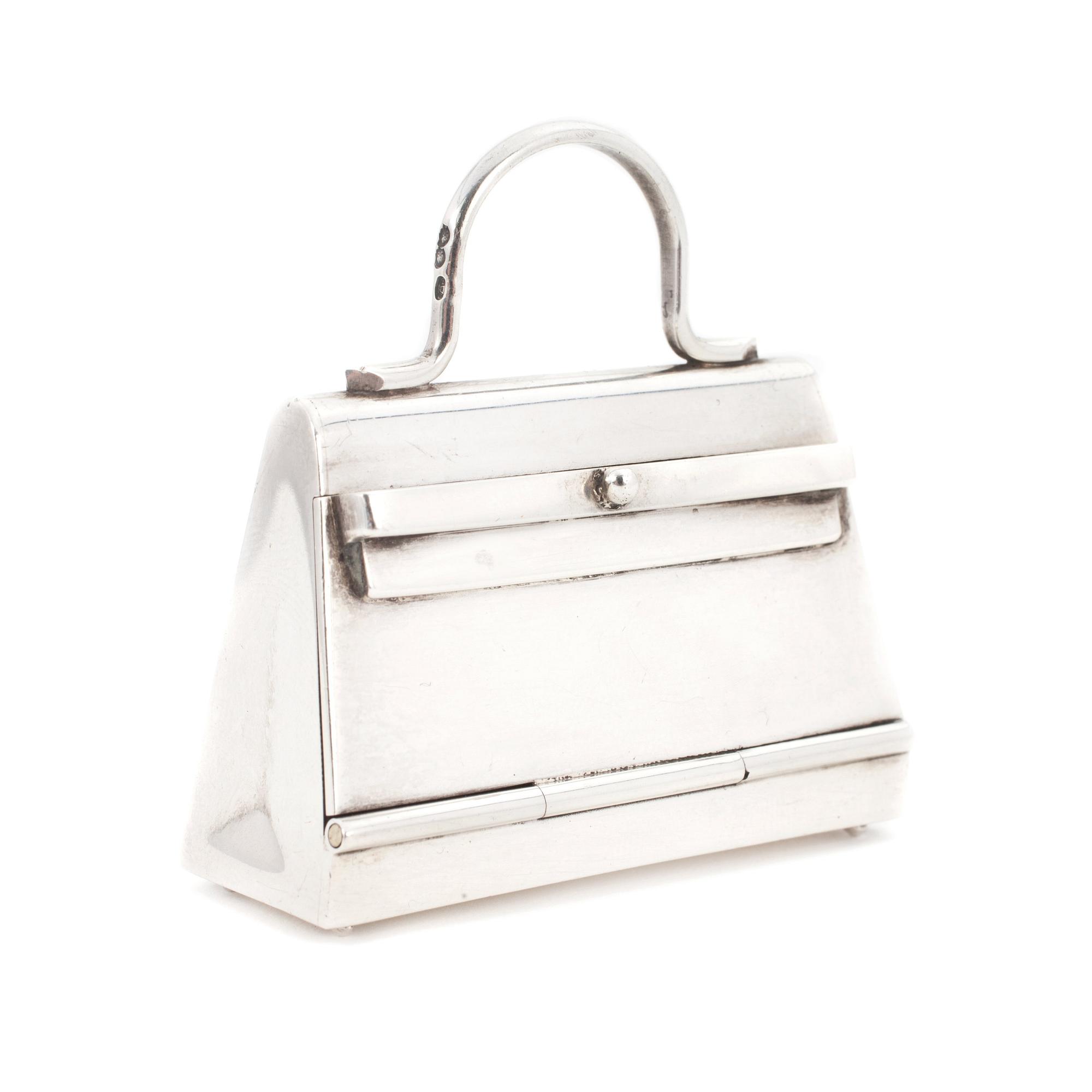 HERMÈS, a sterlingsilver pillcase.